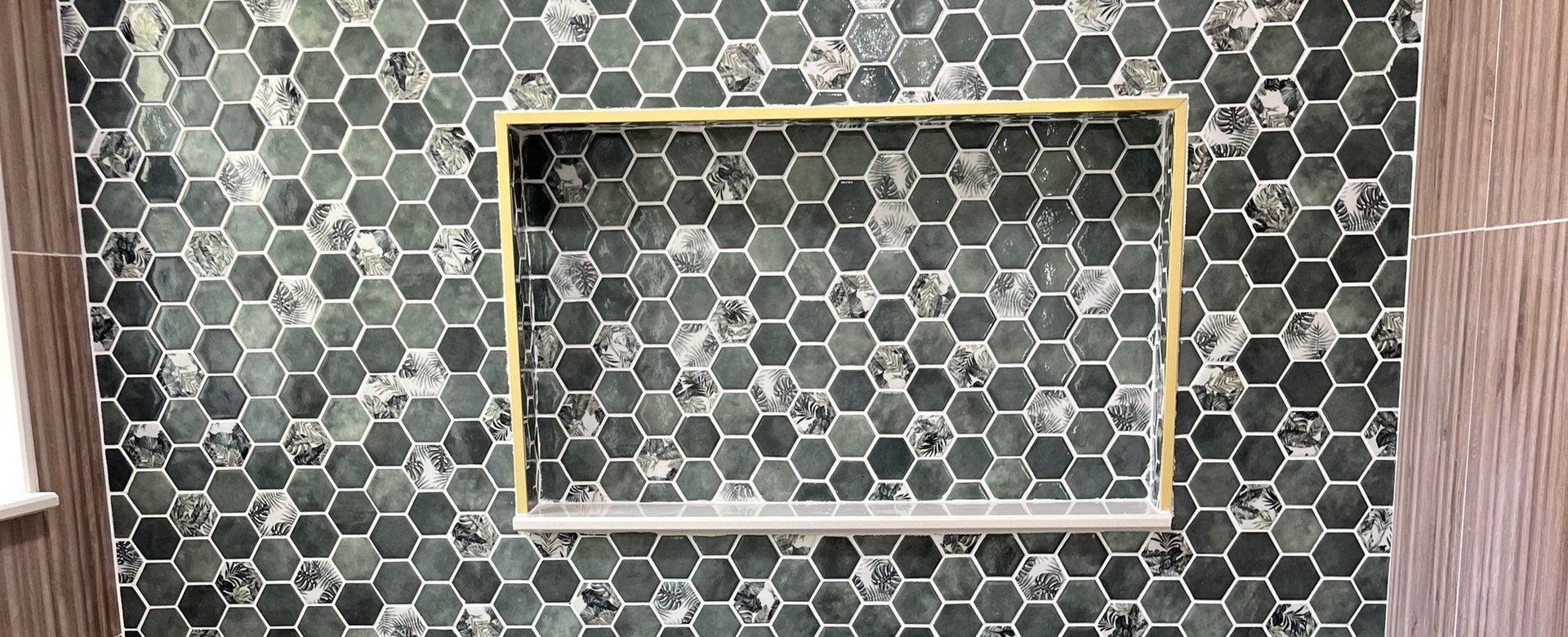 Custom hexagon tile shower with brass niche — Tampa, FL